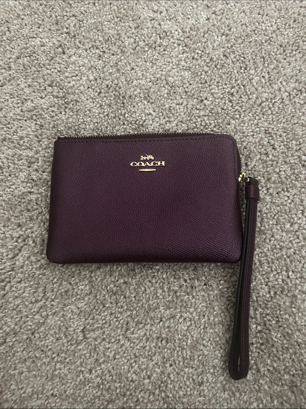 COACH Pebbled Leather Wristlet in Plum with Gold Hardware